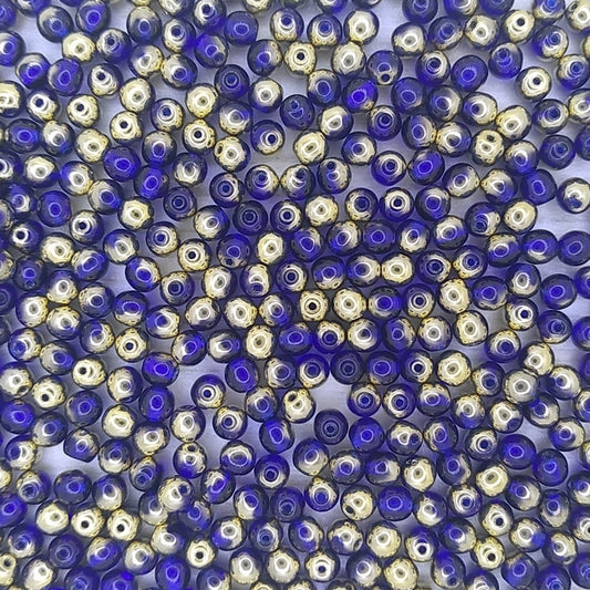 50 x 4mm round beads in Sapphire/Amber *