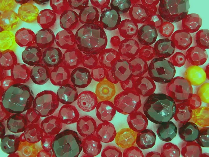 25g of faceted beads in Dark Red from Preciosa