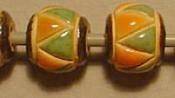 CSB-14-B round bead in Green and Orange triangle from Golem Studio