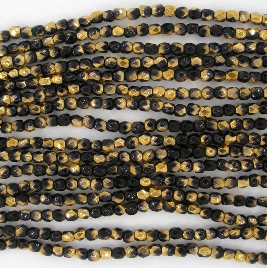 50 x True 2mm faceted beads in Black/Amber