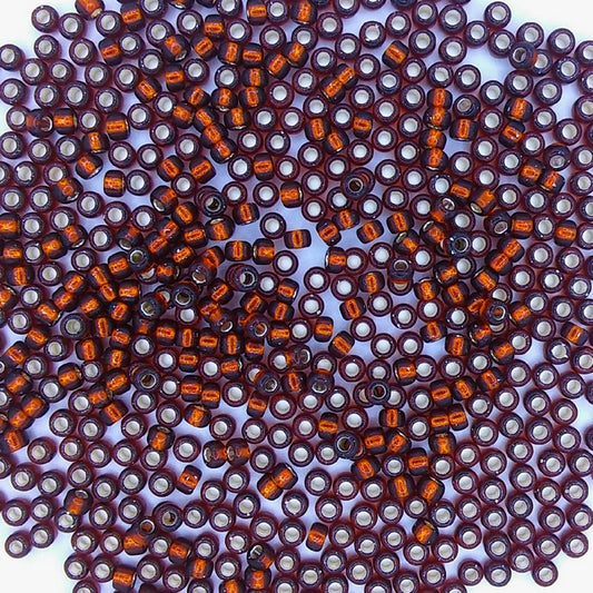 0005 - 10g Size 8/0 Miyuki seed beads in Silver Lined Dark Topaz