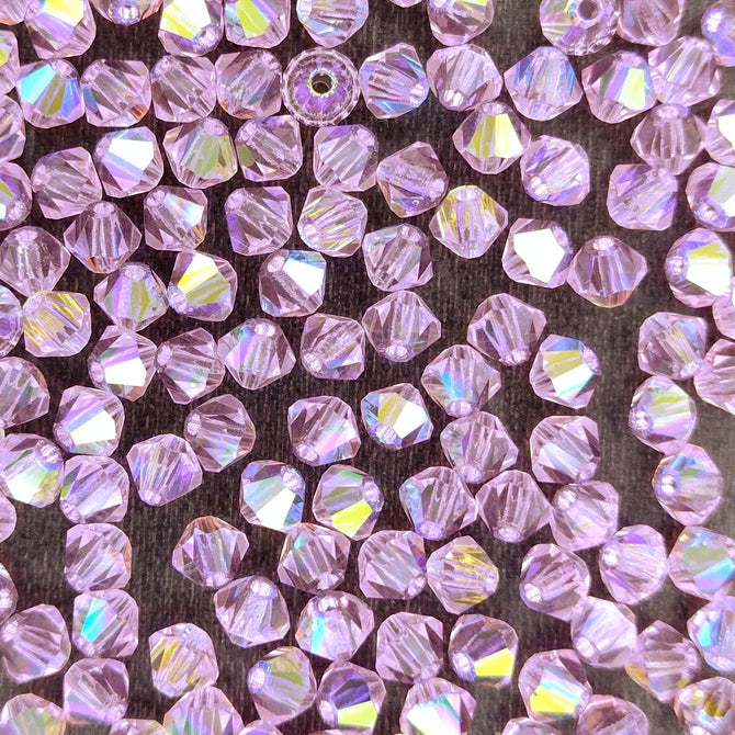 24 x 4mm bicones in Pink Sapphire AB (Preciosa)