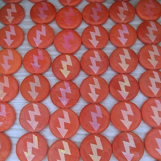 8 x 16mm discs in Matt Orange with laser etched High Voltage design