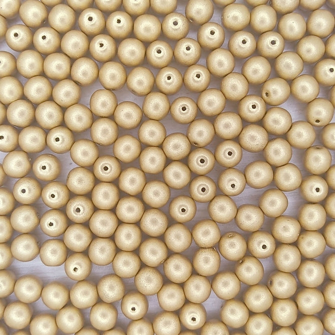 25 x 6mm round beads in Aztec Gold