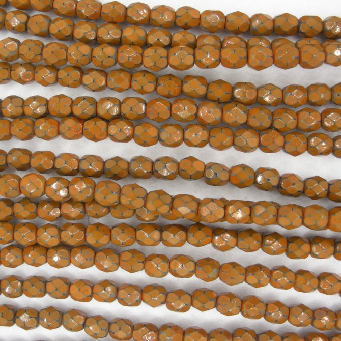 38 x 4mm snake skin beads in Amber