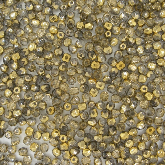 50 x 3mm faceted beads in Crystal/Amber