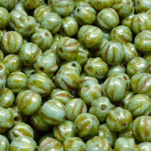 25 x 6mm melon beads in Opaque Green Picasso