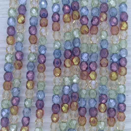 50 x 4mm faceted beads in Crystal/Spring Mix