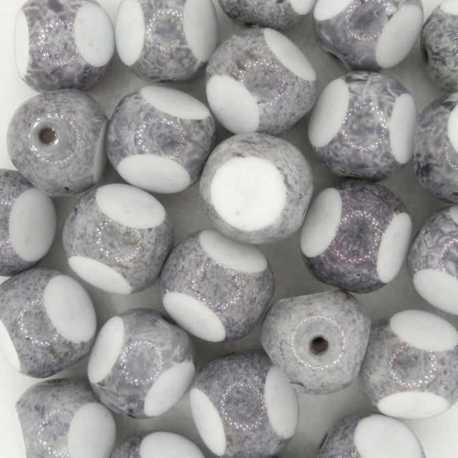 Pair of 11mm beads in White/Grey Stone with three cuts