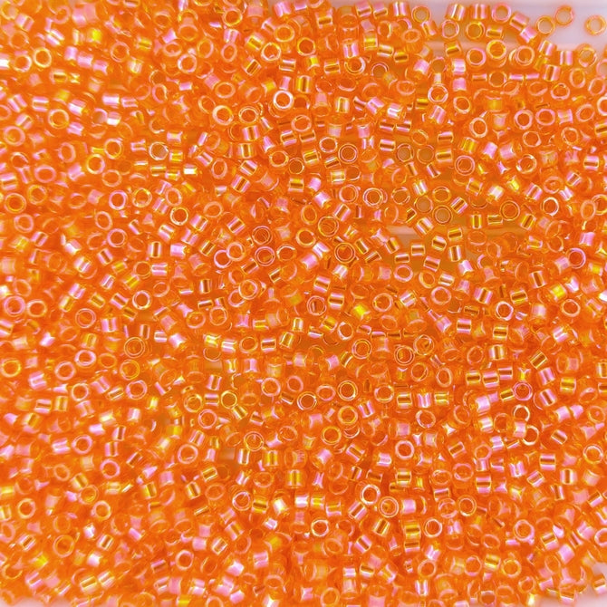 DB0151 - 1g Size 11/0 delicas in Transparent Orange AB