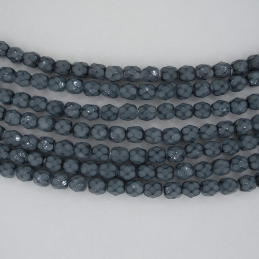 38 x 4mm snake skin beads in Placid Blue