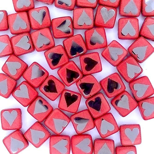 25 x 6mm Czech tiles in Matt Red with Laser etched Chrome Hearts