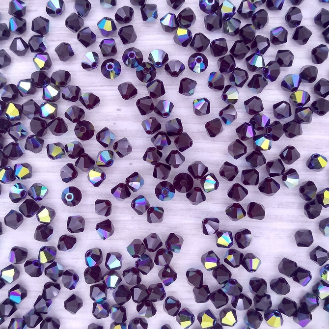 24 x 4mm bicones in Garnet AB (Preciosa)