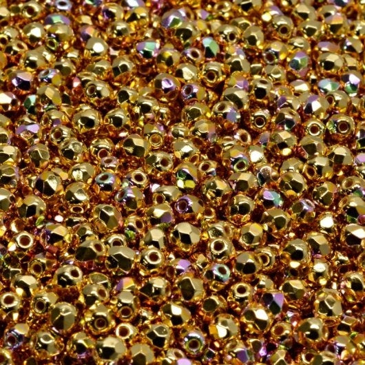 50 x True 2mm faceted beads in 24kt Gold plated AB