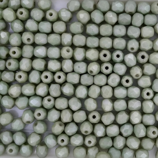 50 x 4mm faceted beads in Matt Chalk White/Green Lustre