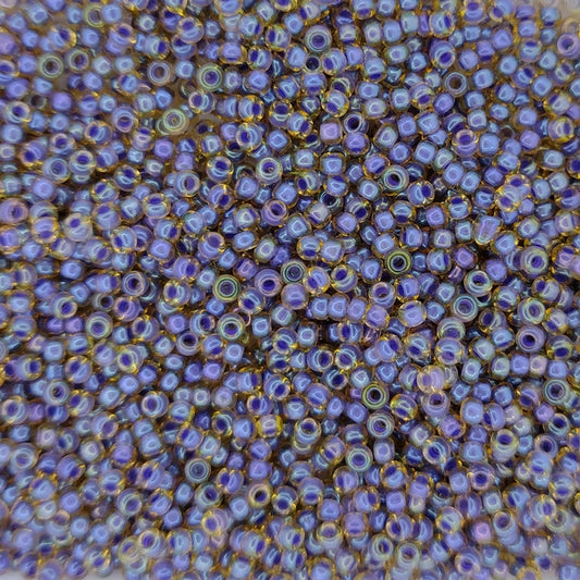0348 - 10g Size 11/0 Miyuki seed beads in Purple lined Light Topaz Lustre
