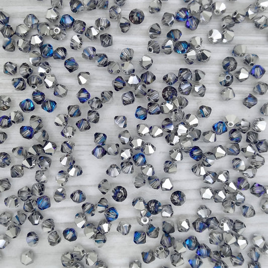 24 x 4mm bicones in Crystal Bermuda Blue (Preciosa)