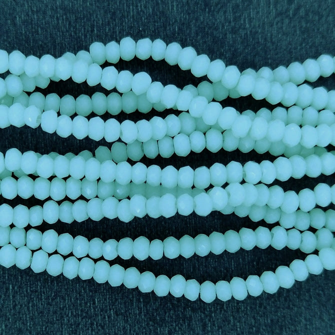 200 x 1mm Chinese cut beads in Chrysolite Opal
