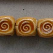 GRB-02-AM triangular bead in Caramel from Golem Studio